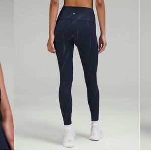 Lululemon Wunder Train High Rise‎ Tight 25” in Sun Bleached Wash True Navy Sz 10